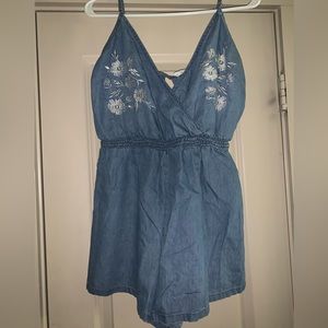 Denim romper with floral embroidery